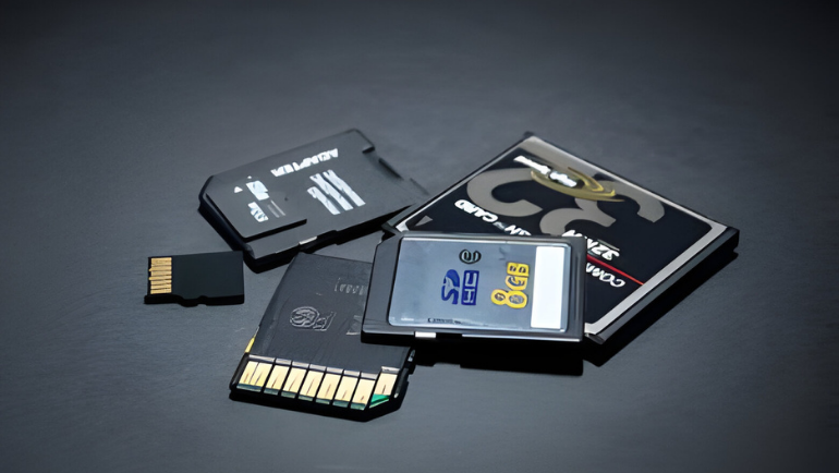 nand flash SDcard, compactflash cards and microSD cards on a table 