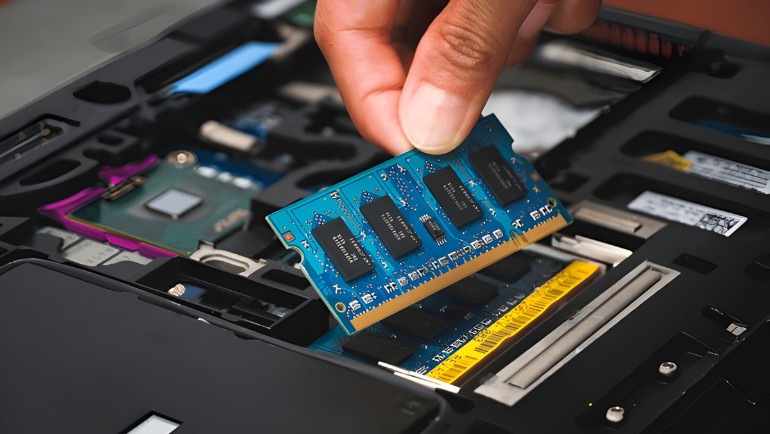 Best DDR5 MTC20C2085S1TC48BA1R RAM being inserted in a laptop