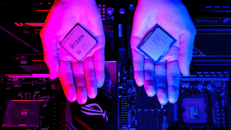 two hands showing intel and amd processor