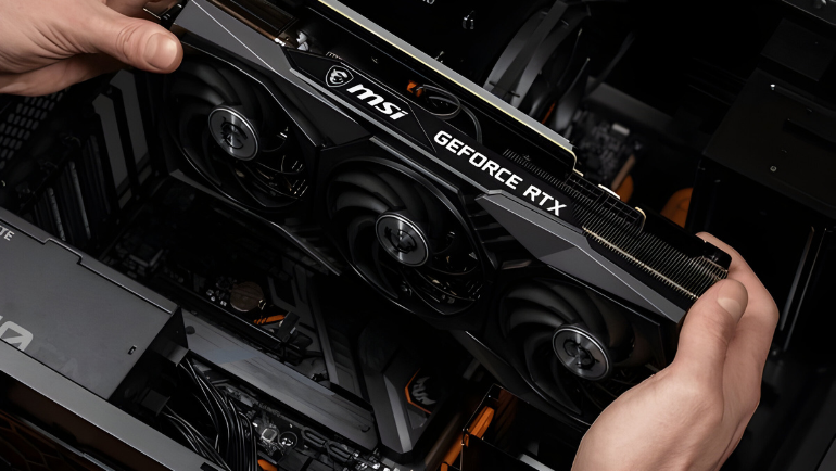 A hand taking out RTX GPU